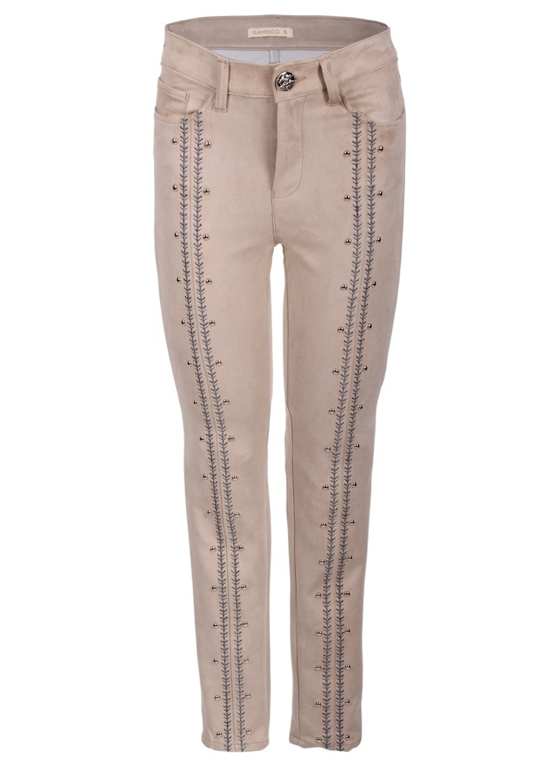 Calças skinny com tachas