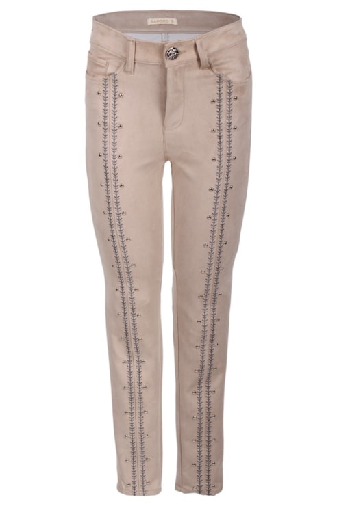 Calças skinny com tachas
