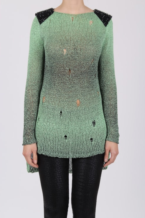 Knitted sweater with shoulder application