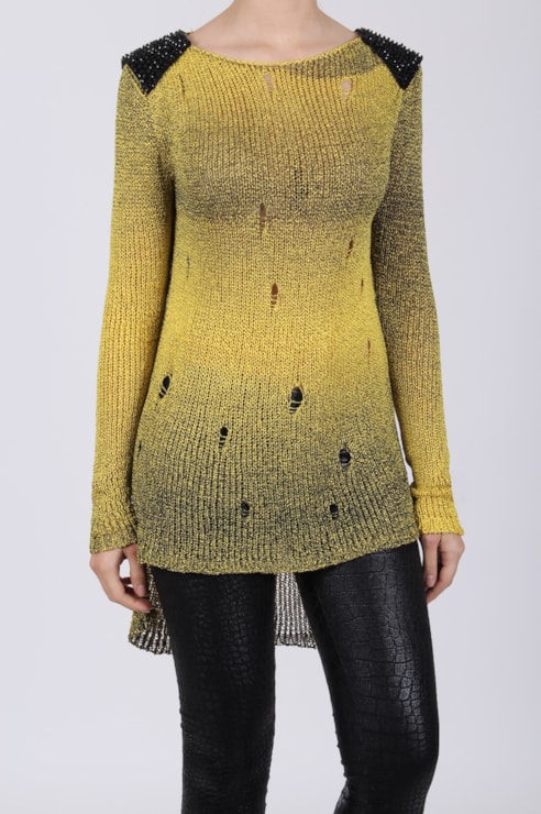 Knitted sweater with shoulder application