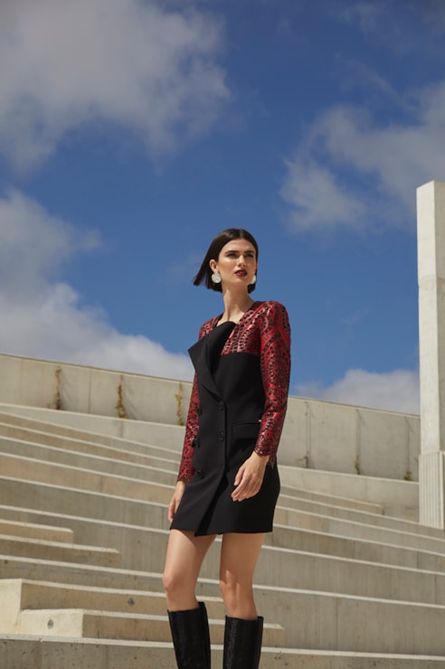 Blazer dress with embroidered faux leather sleeves.