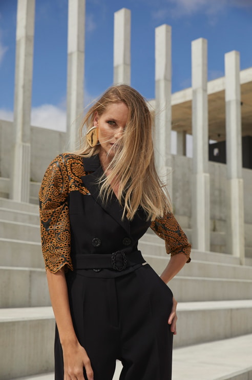 Jumpsuit with embroidered faux leather sleeves.