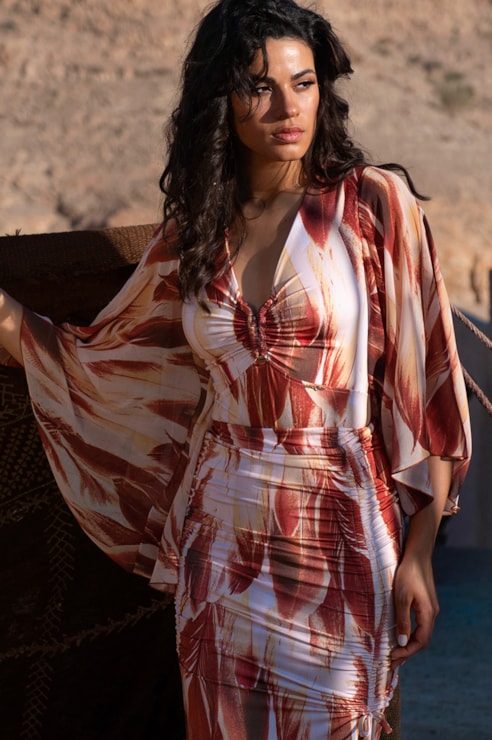 Printed bodysuit with flowing sleeves