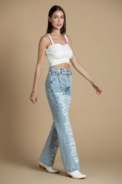 High-waisted jeans with rips and lace detailing